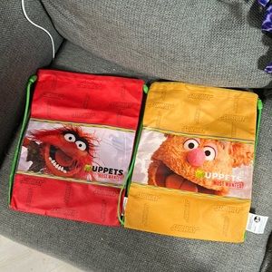 Two like new Muppets Most Wanted Subway draw string bags, Fozzy Bear and Animal